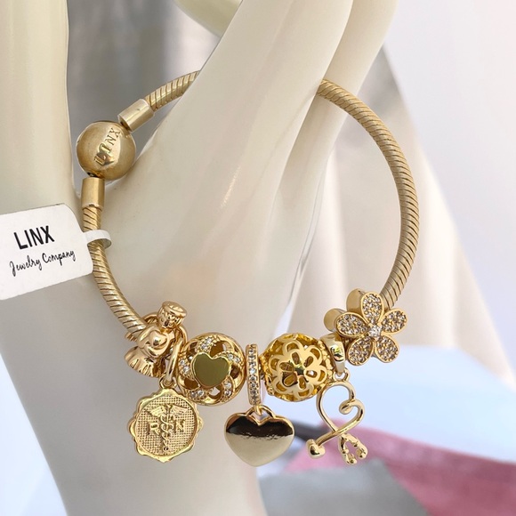 Linx Yellow Gold Snake Chain Bracelet with Registered Nurse Themed Charms - Picture 3 of 14